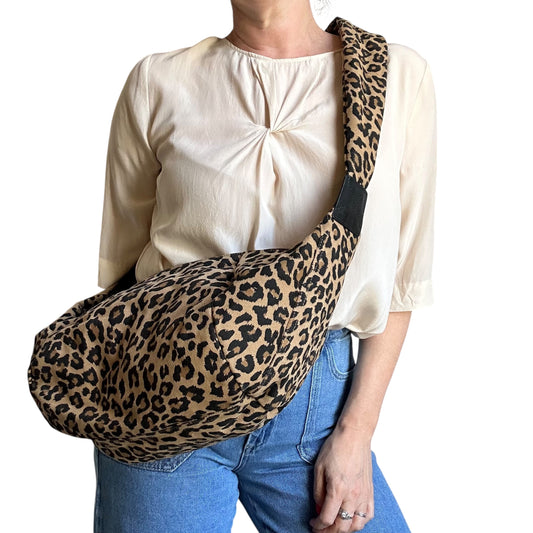 Brixton cross body sling bag - sand leopard print - large