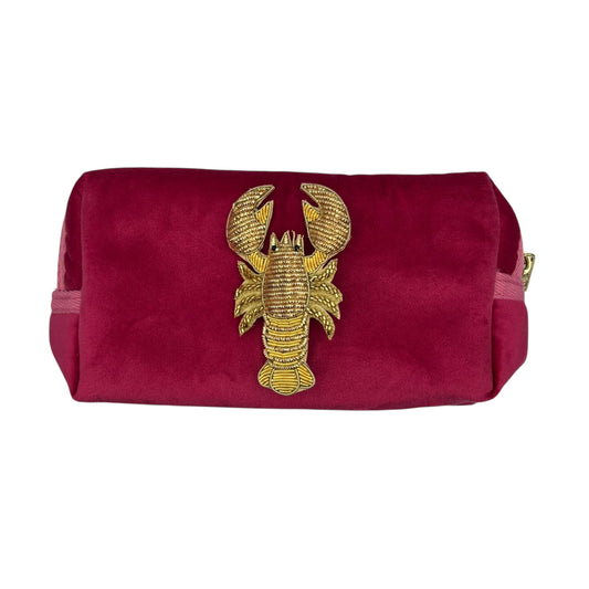 Bright pink makeup bag with detachable Lobster brooch