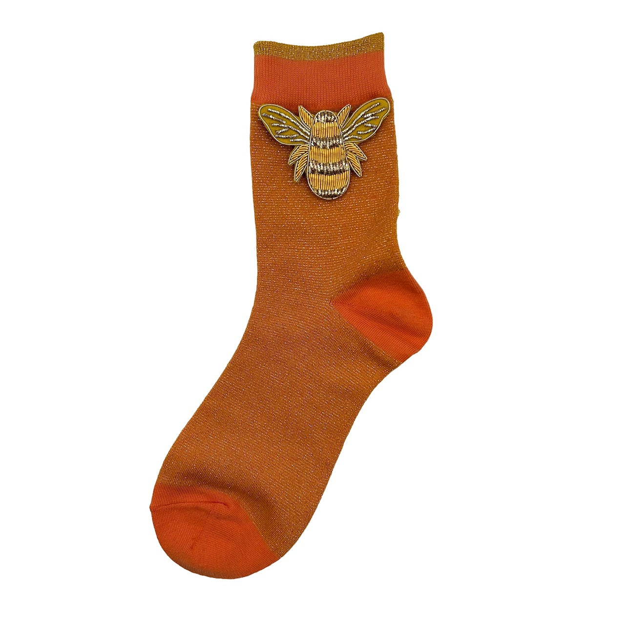 Tokyo socks in cantaloupe with a gold bee brooch