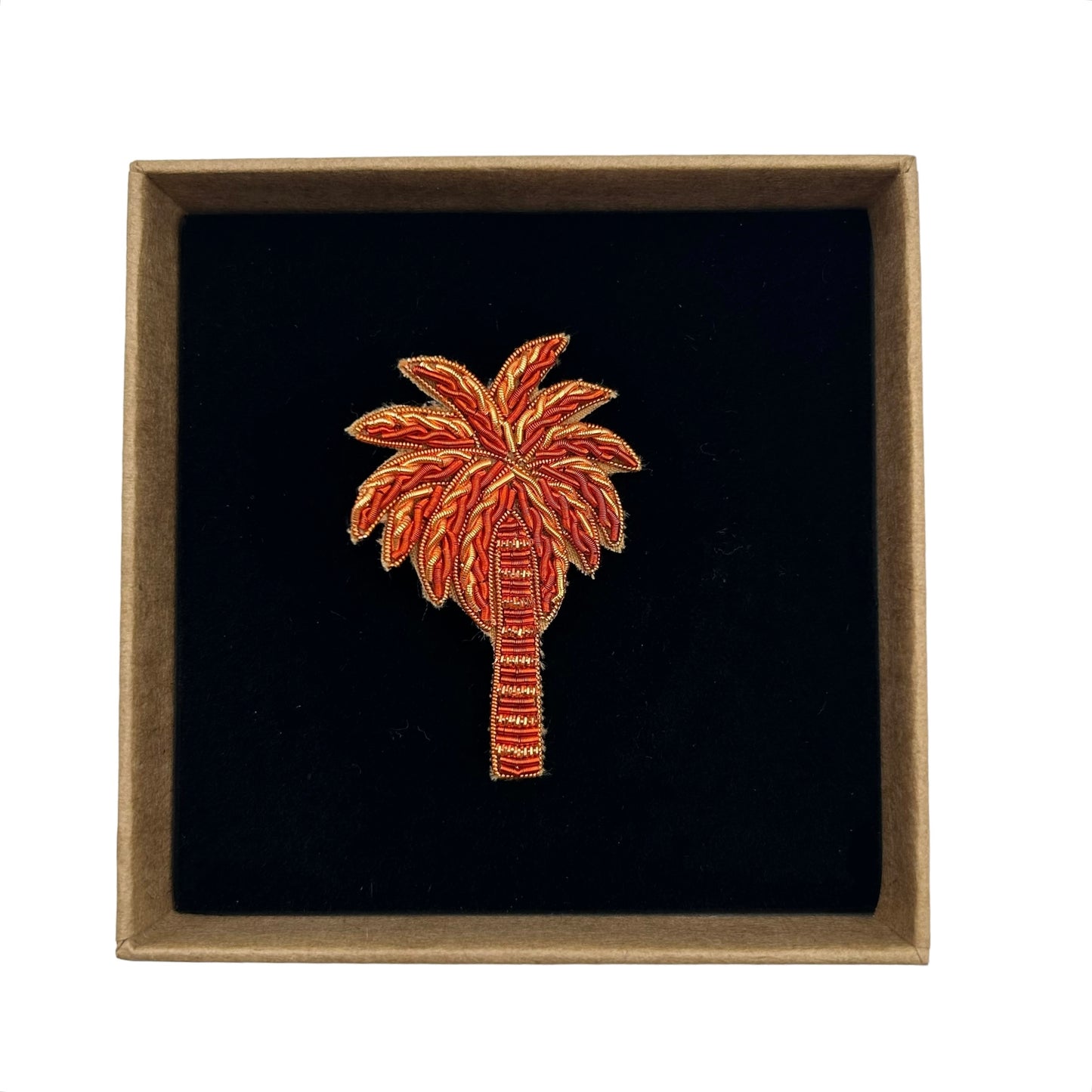 Coral palm tree brooch