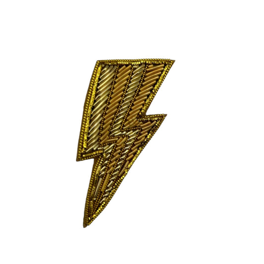 Golden lightning bolt brooch / pin