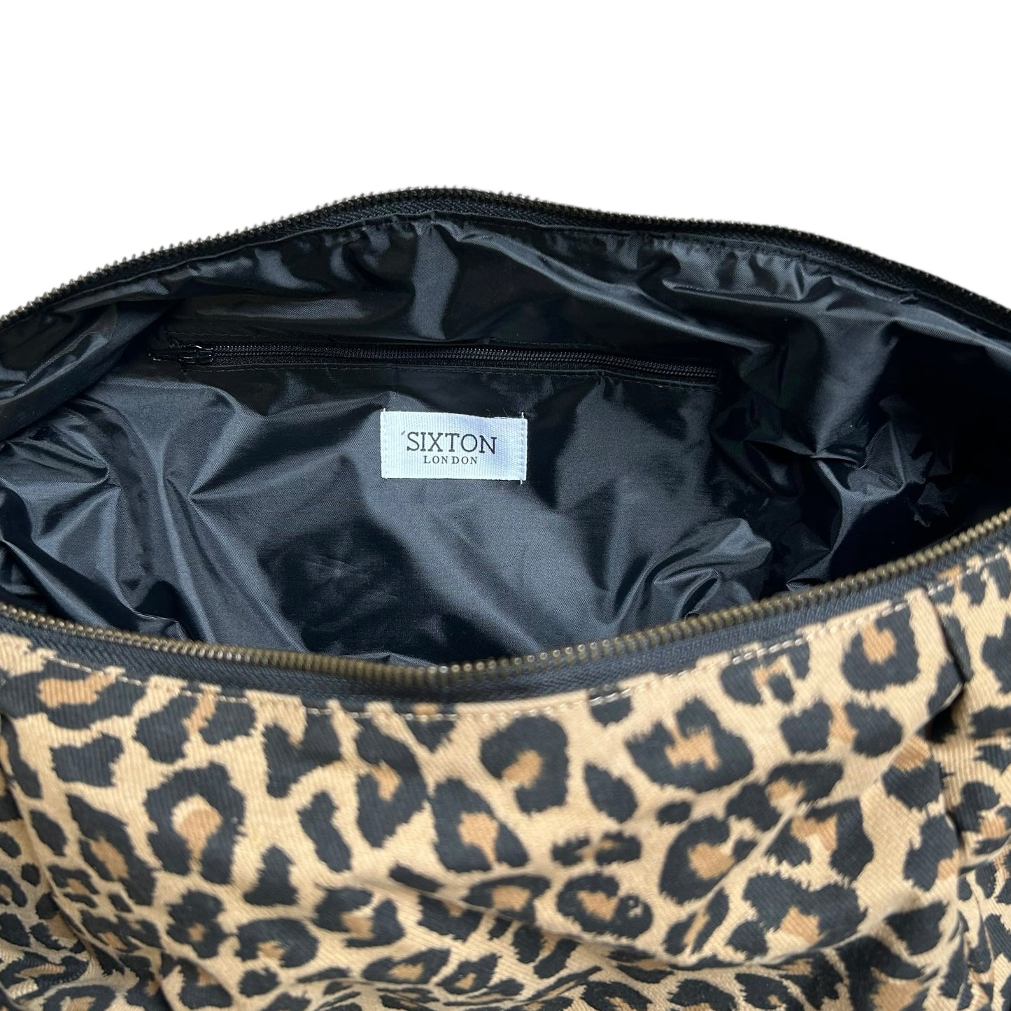 Brixton cross body sling bag - sand leopard print - large