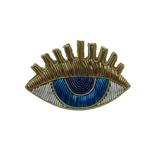 Blue eyes gold lashes pin