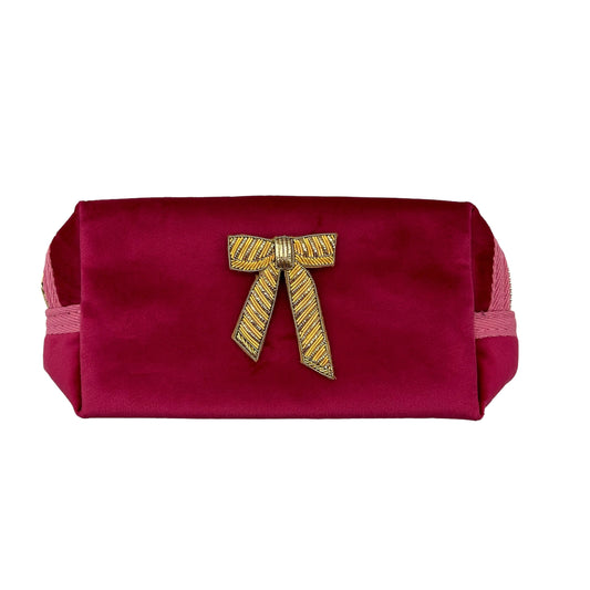 Bright pink makeup bag with Bow brooch