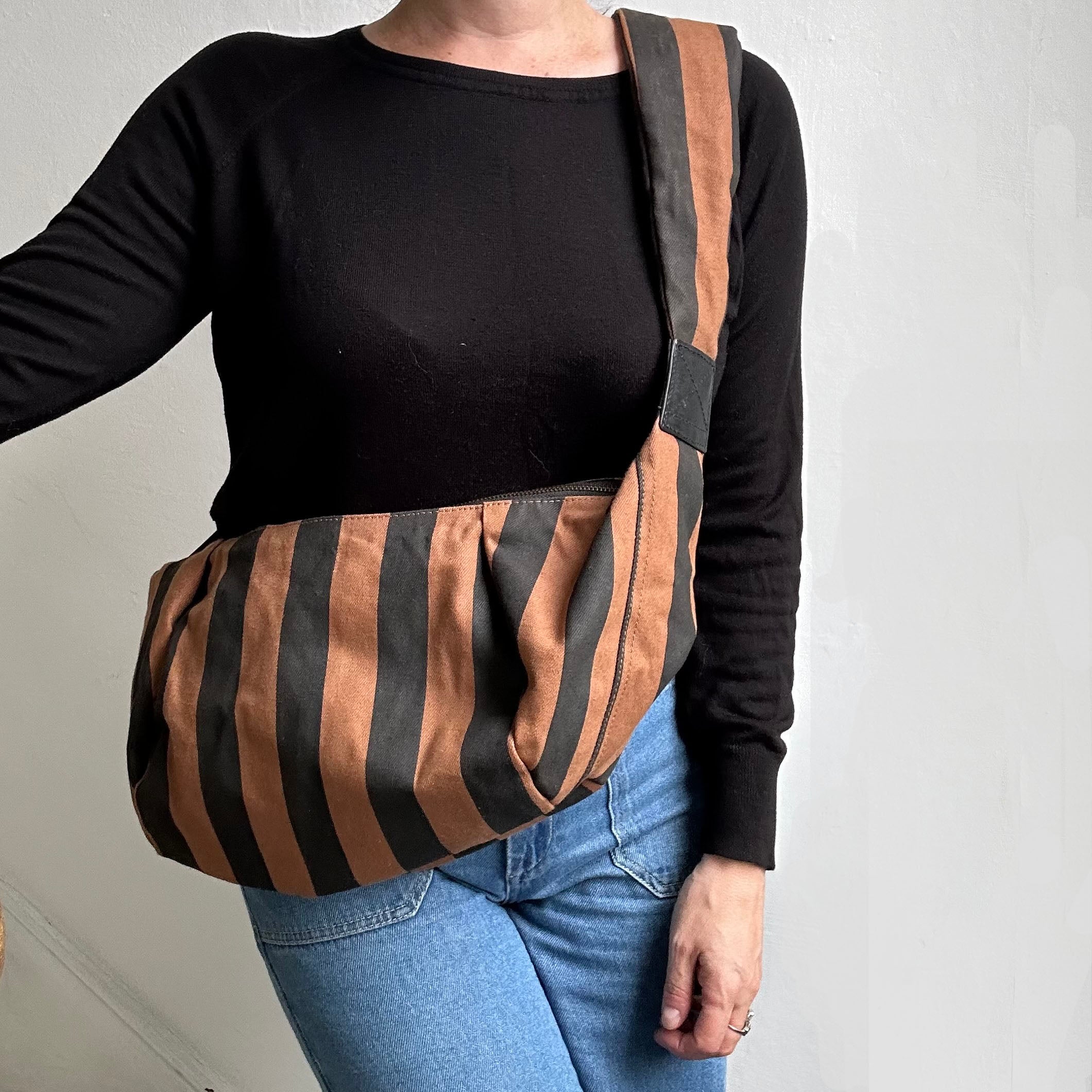 Stylish sling backpack online