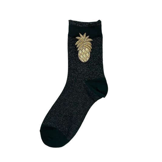 Tokyo socks in teal with a pineapple brooch