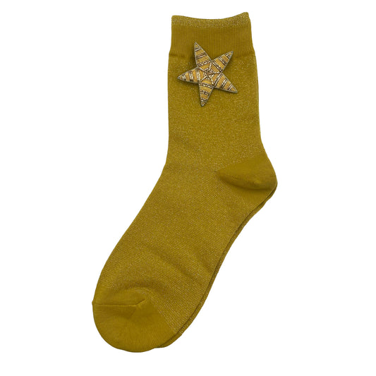 Tokyo socks in yellow with a gold star brooch