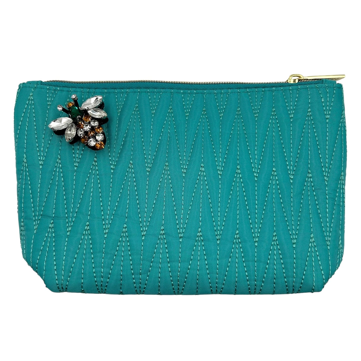 Turquoise Tribeca make up bag with a queen bee pin