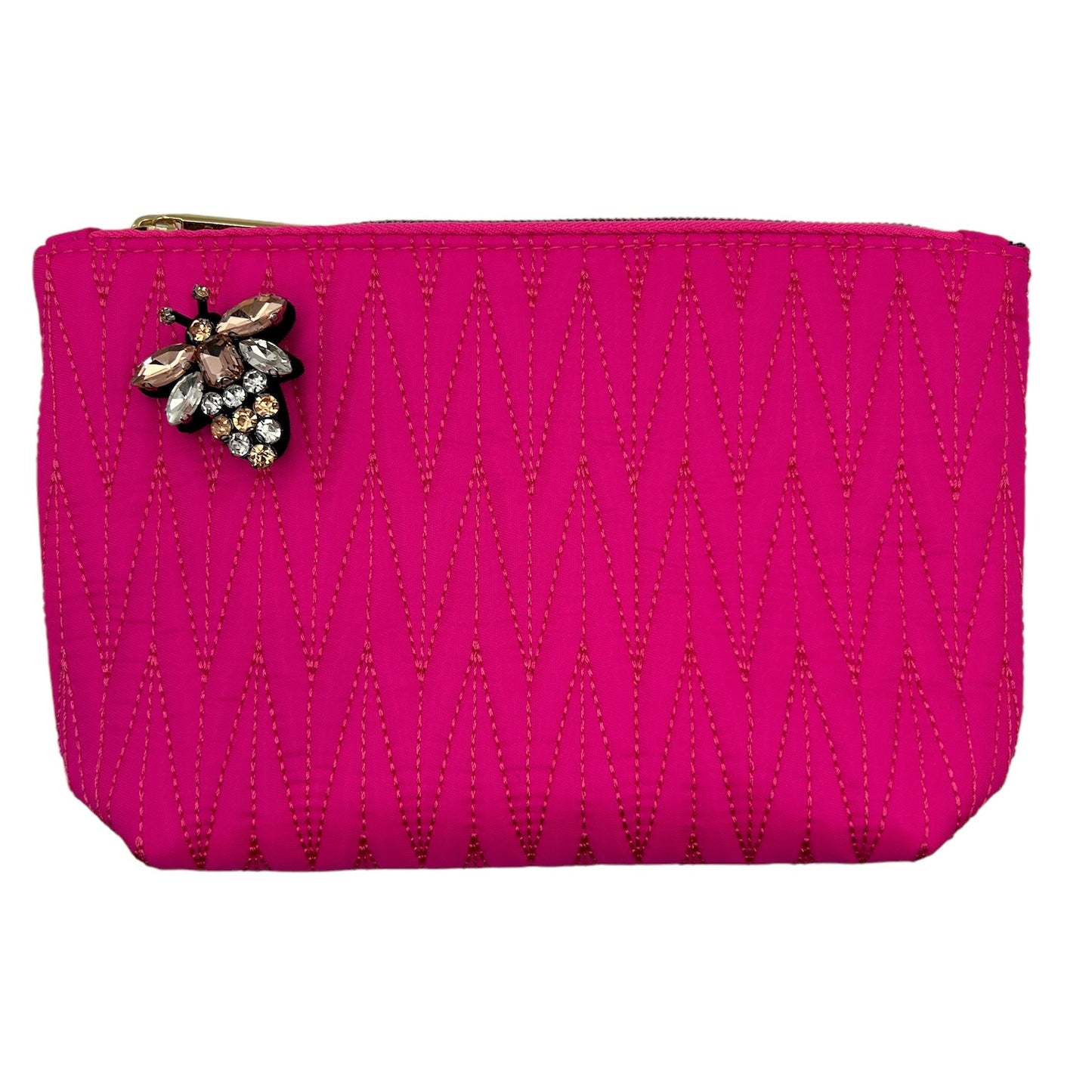Bright pink Tribeca make up bag with a queen bee pin