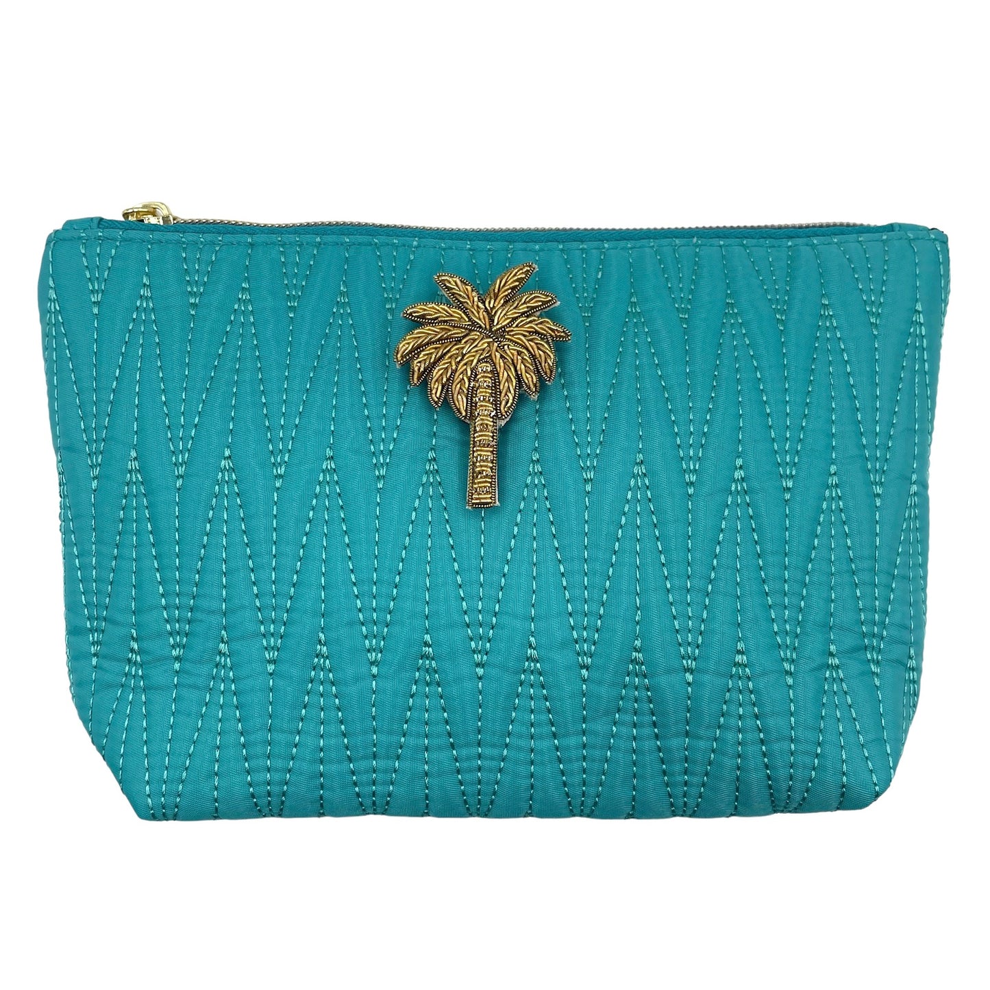 Turquoise Tribeca make up bag with a palm tree pin