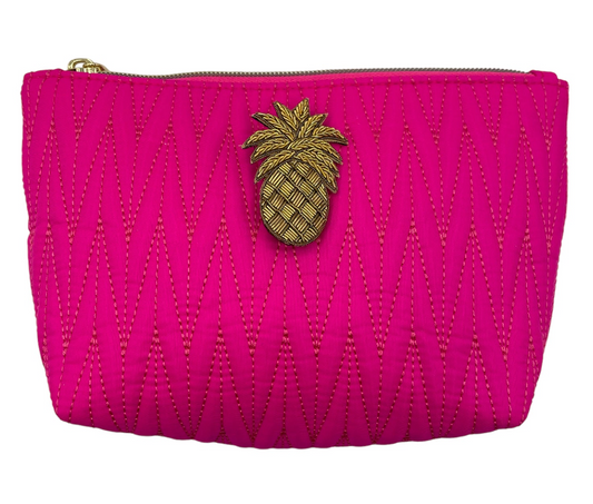 Bright pink Tribeca make up bag with pineapple pin