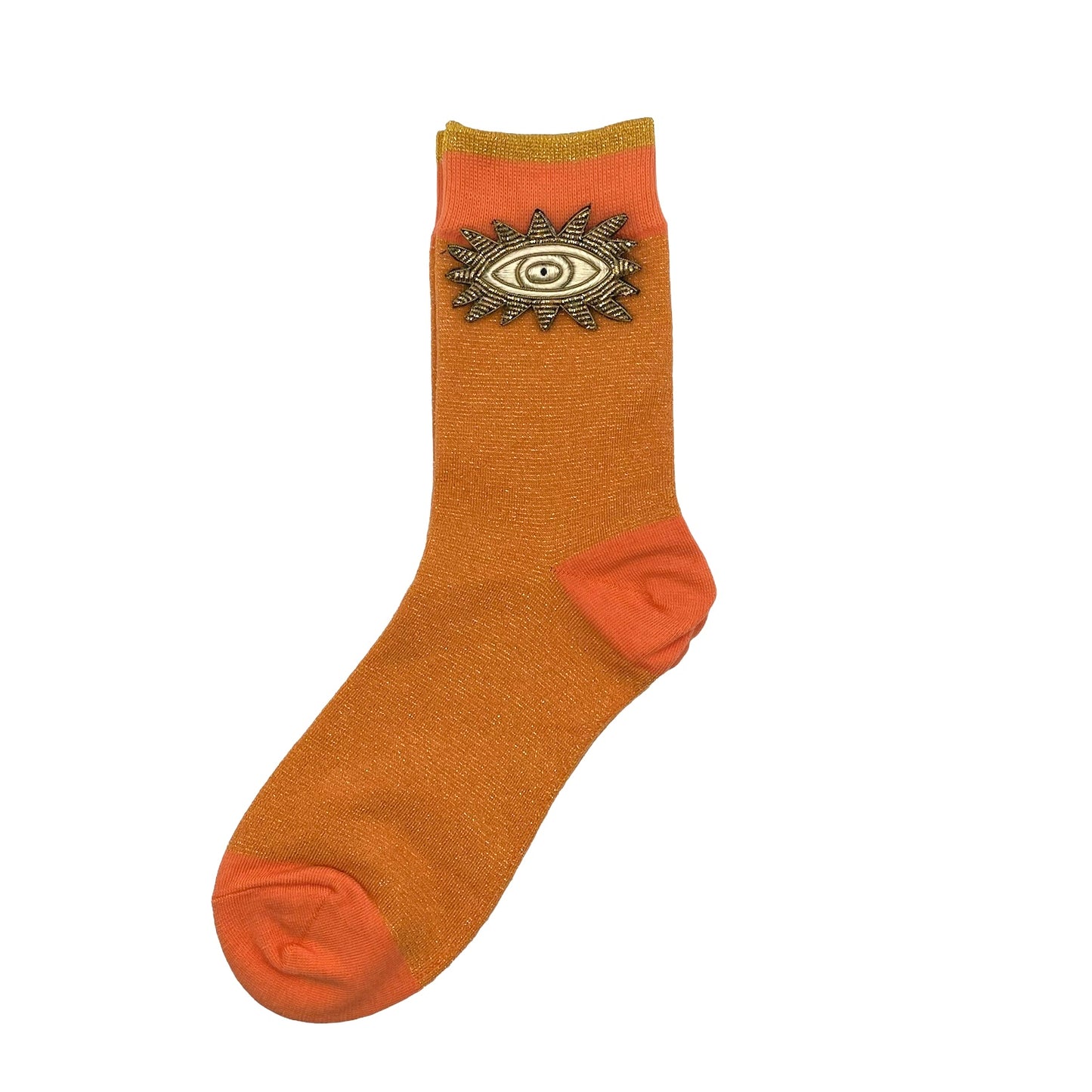 Tokyo socks in cantaloupe with a metallic eyes brooch
